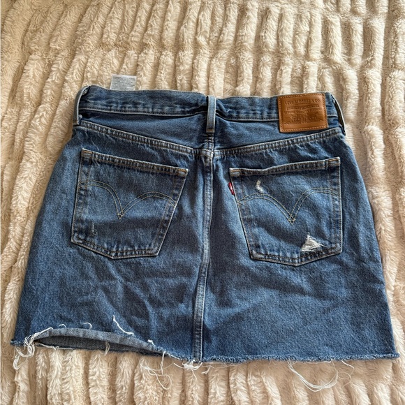 Levi's Dresses & Skirts - Levi's Dark Blue Distressed Denim Mini Skirt